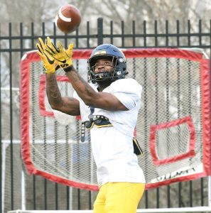 WVU Mountaineers practice drills Tuesday. : Gallery